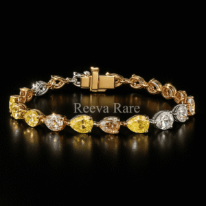 Pink, yellow, and white pear diamond vintage bracelet, luxury jewelry from Reeva Rare