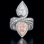 Dual pear diamond ring with pink and white diamonds, luxury statement ring from Reeva Rare Dual pear diamond ring with pink and white diamonds, luxury statement ring from Reeva Rare